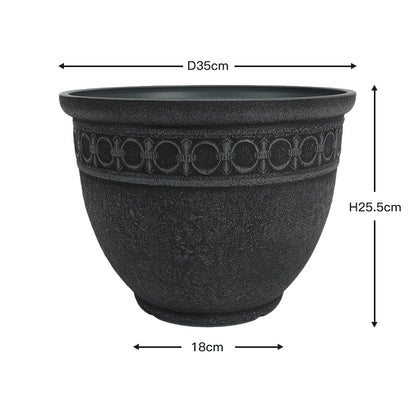 A black textured planter pot with a decorative band of raised circular motifs around the upper middle, shown with dimension arrows and labels indicating a diameter of 35 cm, height of 25.5 cm, and base width of 18 cm.