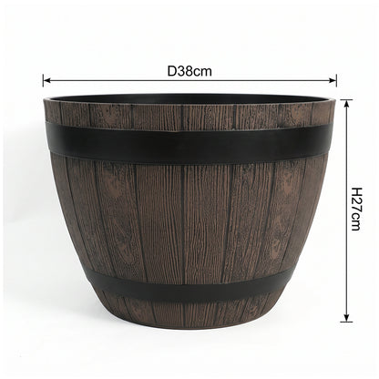 A dark brown faux-wood barrel planter with black metal bands, shown on a white background with dimension lines indicating a diameter of 38cm and a height of 27cm.