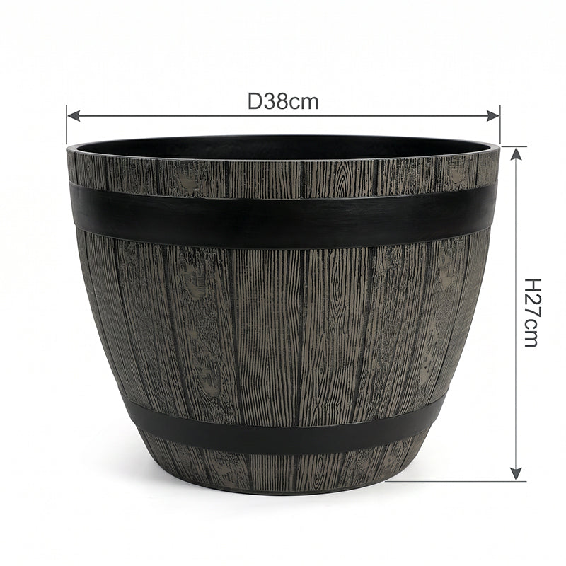 A dark gray faux-wood barrel planter with black metal bands, shown with dimension lines indicating a diameter of 38cm and a height of 27cm on a white background.