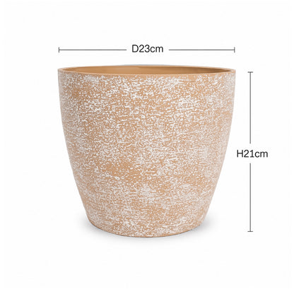 A tapered ceramic planter with a textured, speckled finish in a warm tan and white pattern, shown with dimension lines indicating a diameter of 23cm and a height of 21cm.